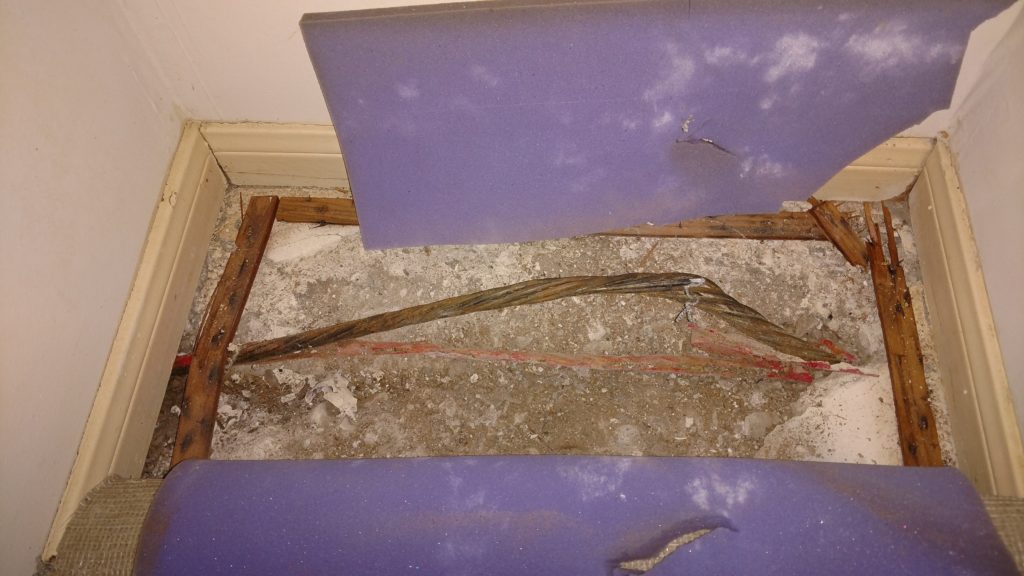 failed tendon cable ruptured through surface of the foundation